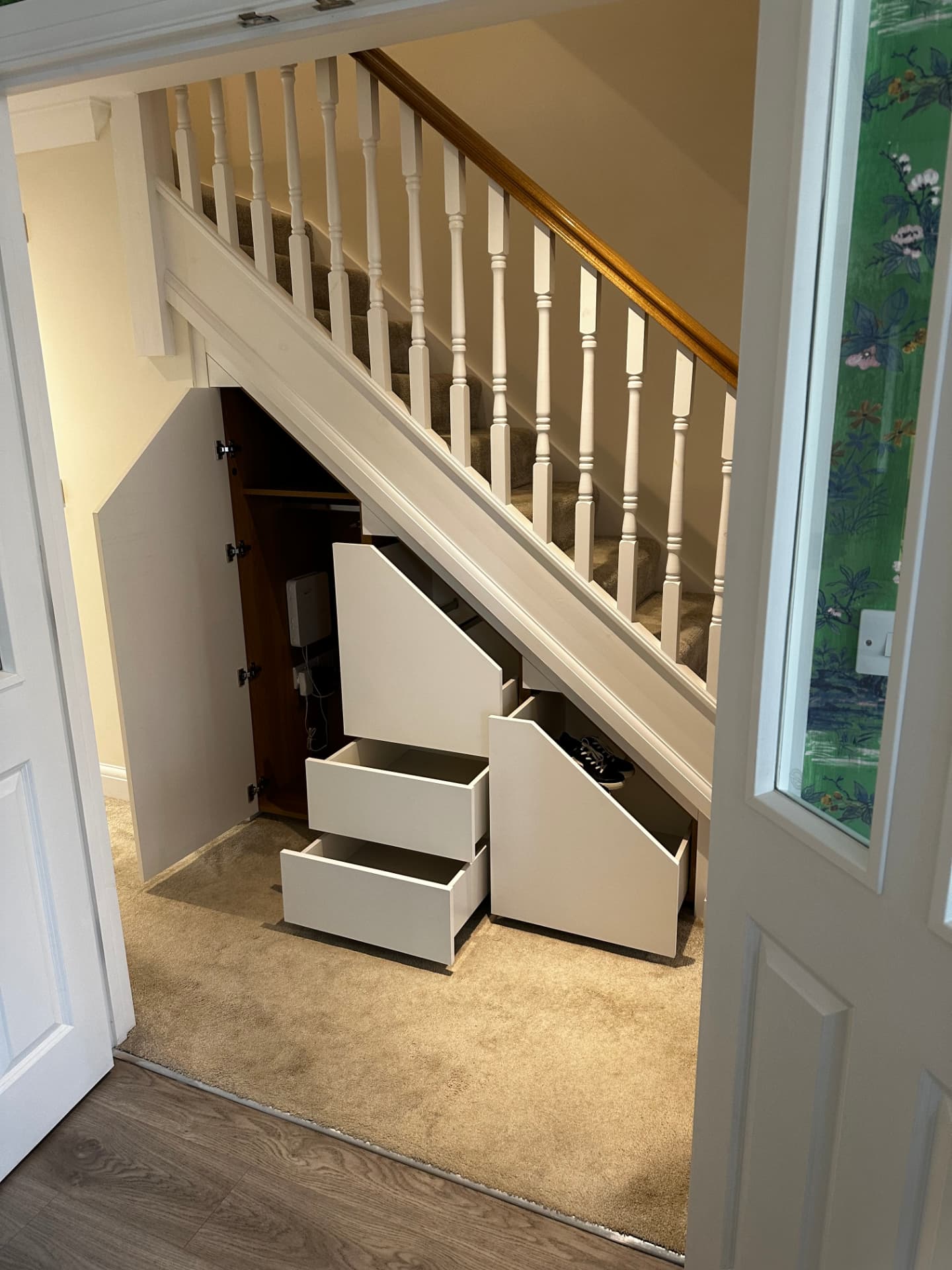 Open bespoke under stairs cupboards, drawers and pull-out storage